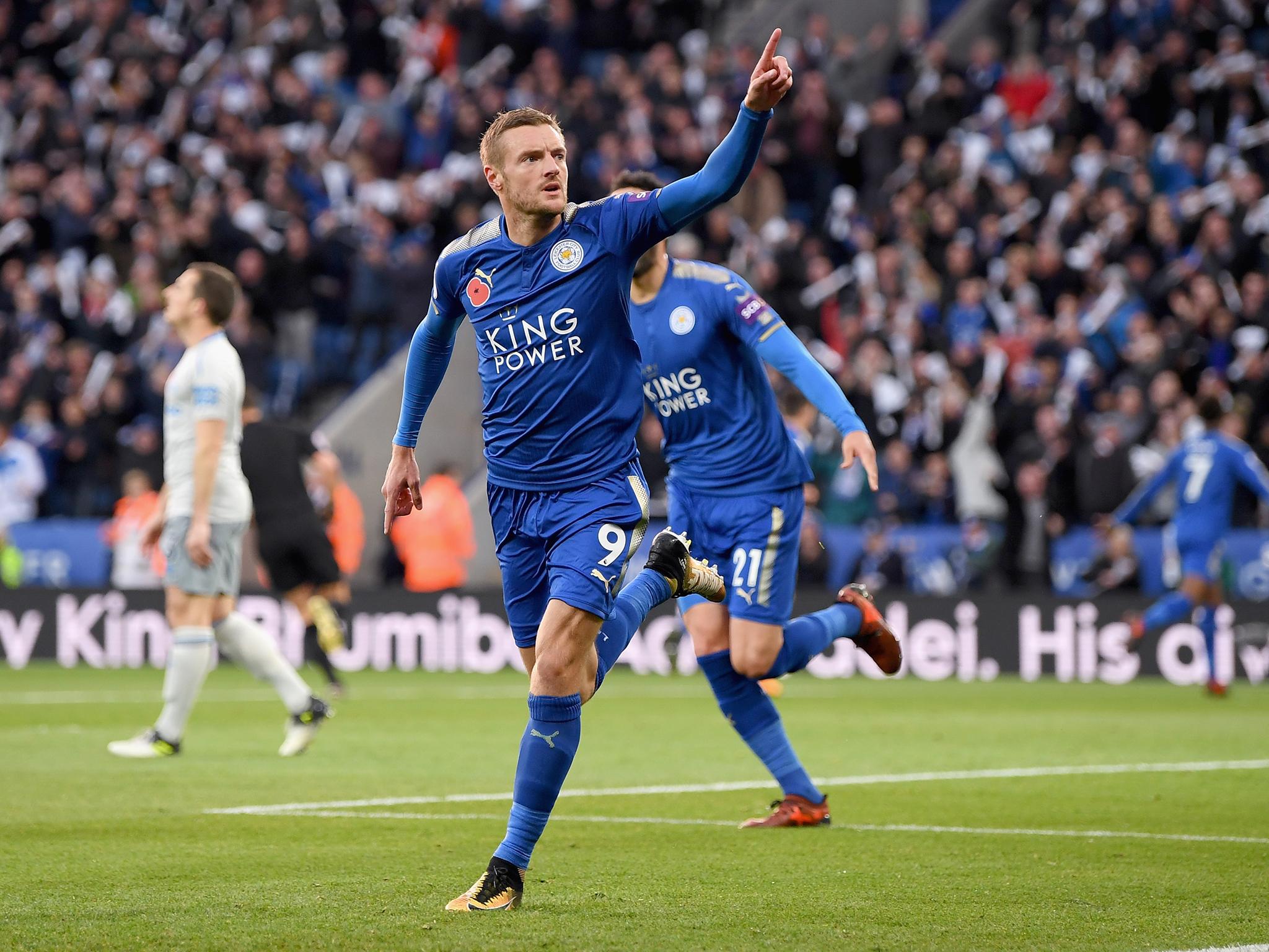 Jamie Vardy celebrates scoring the opening goal for Leicester City against Everton