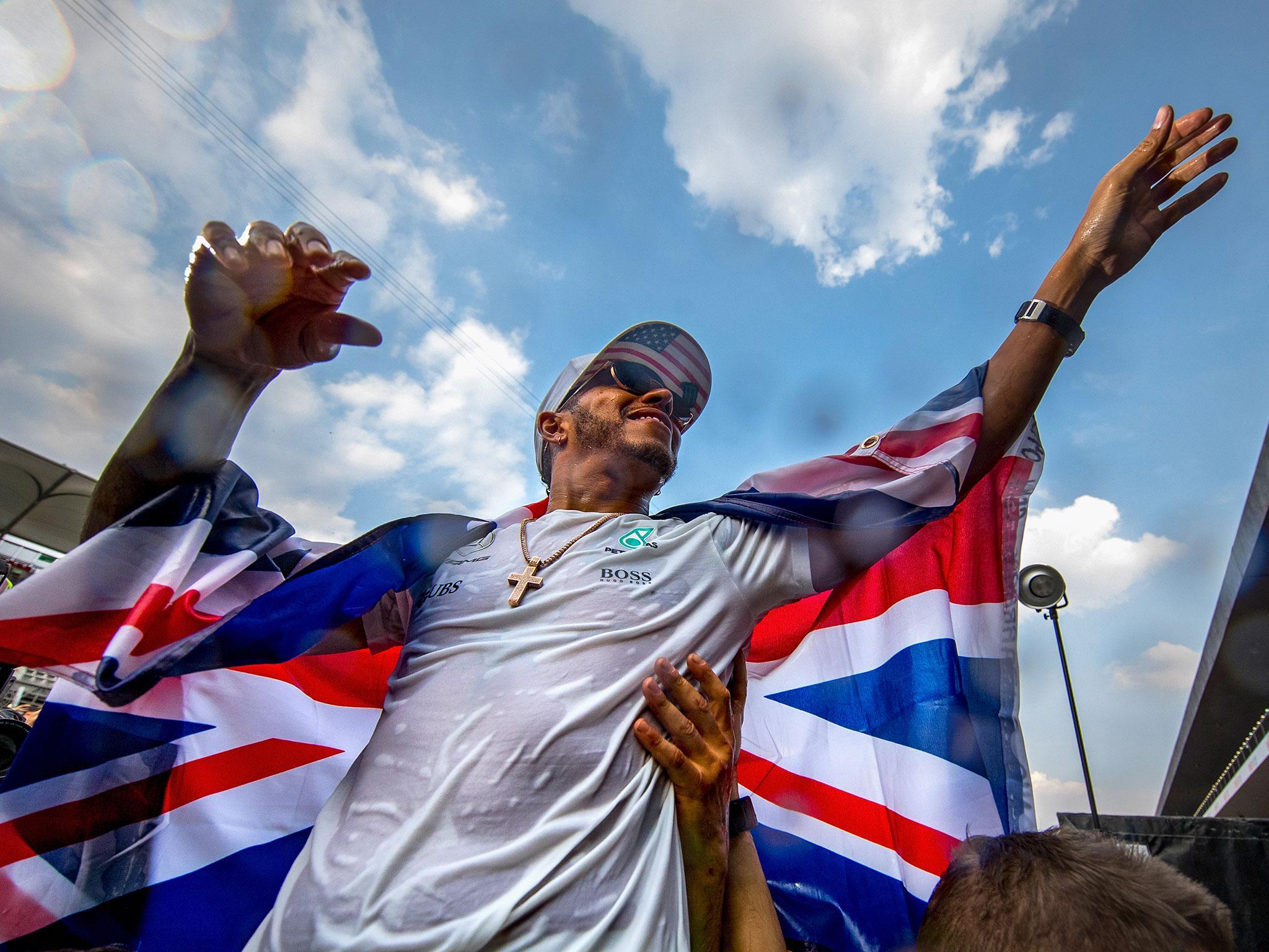 Lewis Hamilton is on top of the world after a fourth title