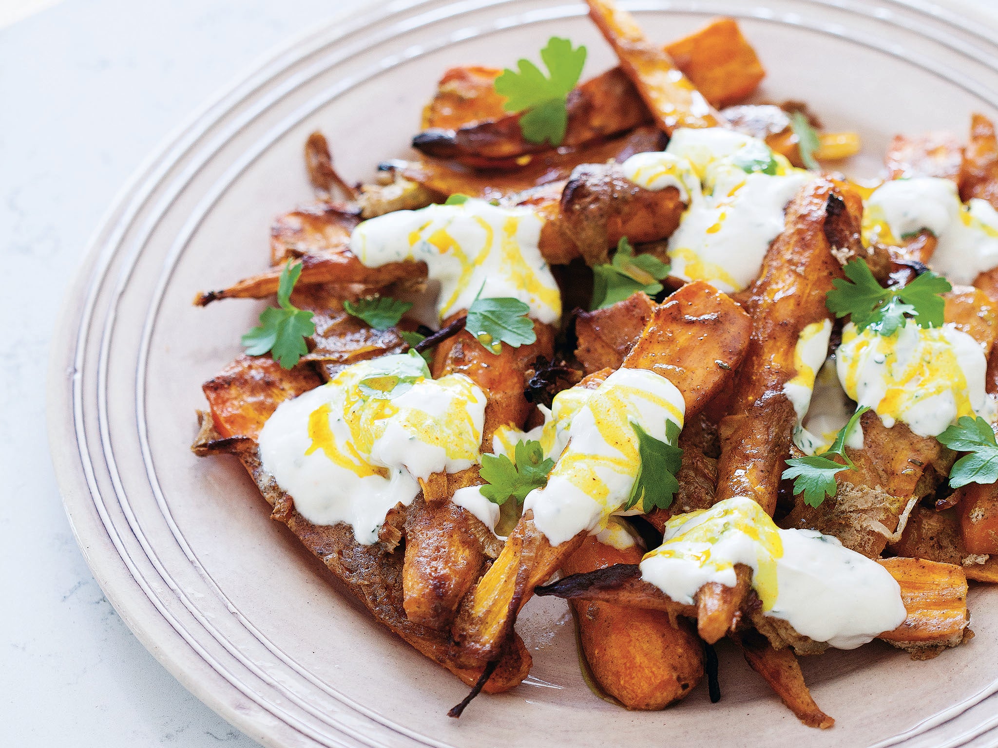 Spicy and satisfying: yoghurt and garam slow-roasted carrots