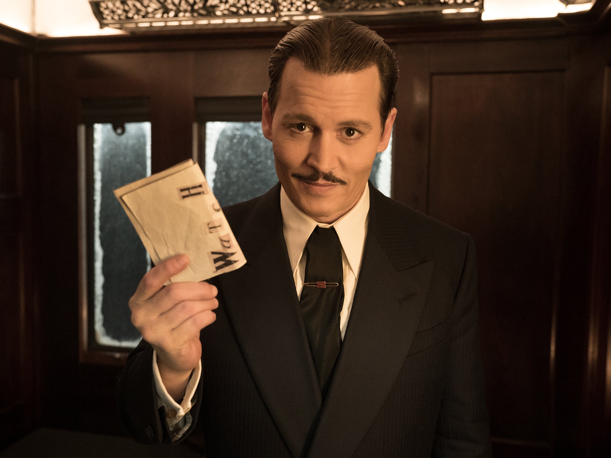 Johnny Depp’s character in ‘Murder on the Orient Express’ has a very sleek, neatly cut moustache