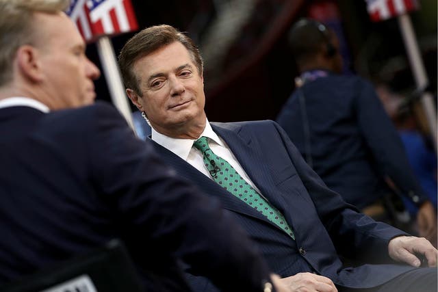 Paul Manafort, former campaign manager for President Donald Trump, is interviewed on the floor of the Republican National Convention 17 July 2016.