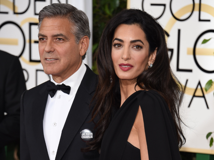 The Clooneys are donating half a million dollars to the organizers of the march