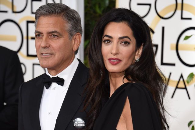The Clooneys are donating half a million dollars to the organizers of the march