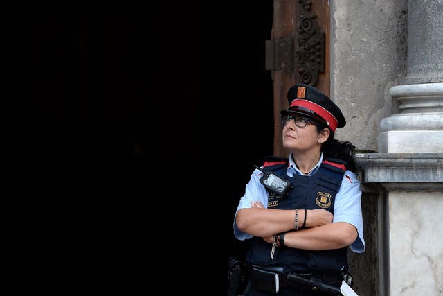A police officer at the main entrance of the Generalitat palace in Barcelona