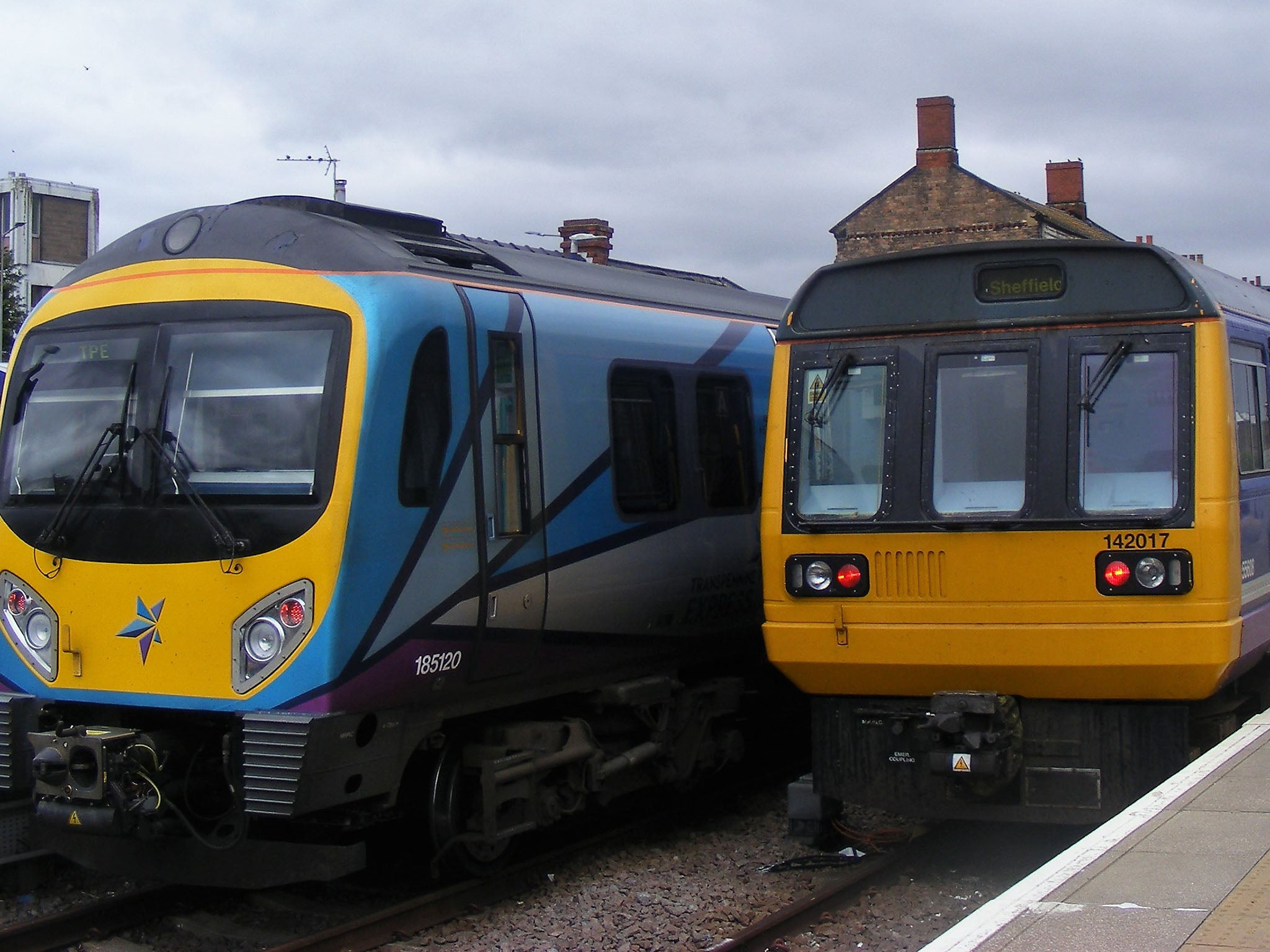 The old &amp; the new-TPE's modern unit heading for Manchester-with Brigg-bound Pacer