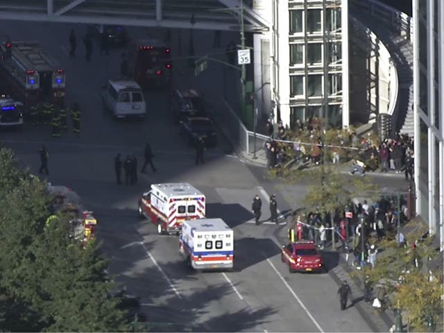 In this still image taken from video, police and ambulances respond to report of gunfire a few blocks from the World Trade Center in New York on 31 October 2017