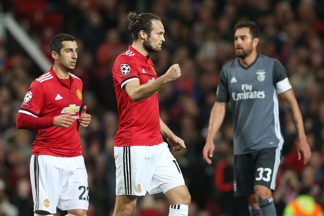 Daley Blind celebrates after converting from the spot to double the hosts' lead