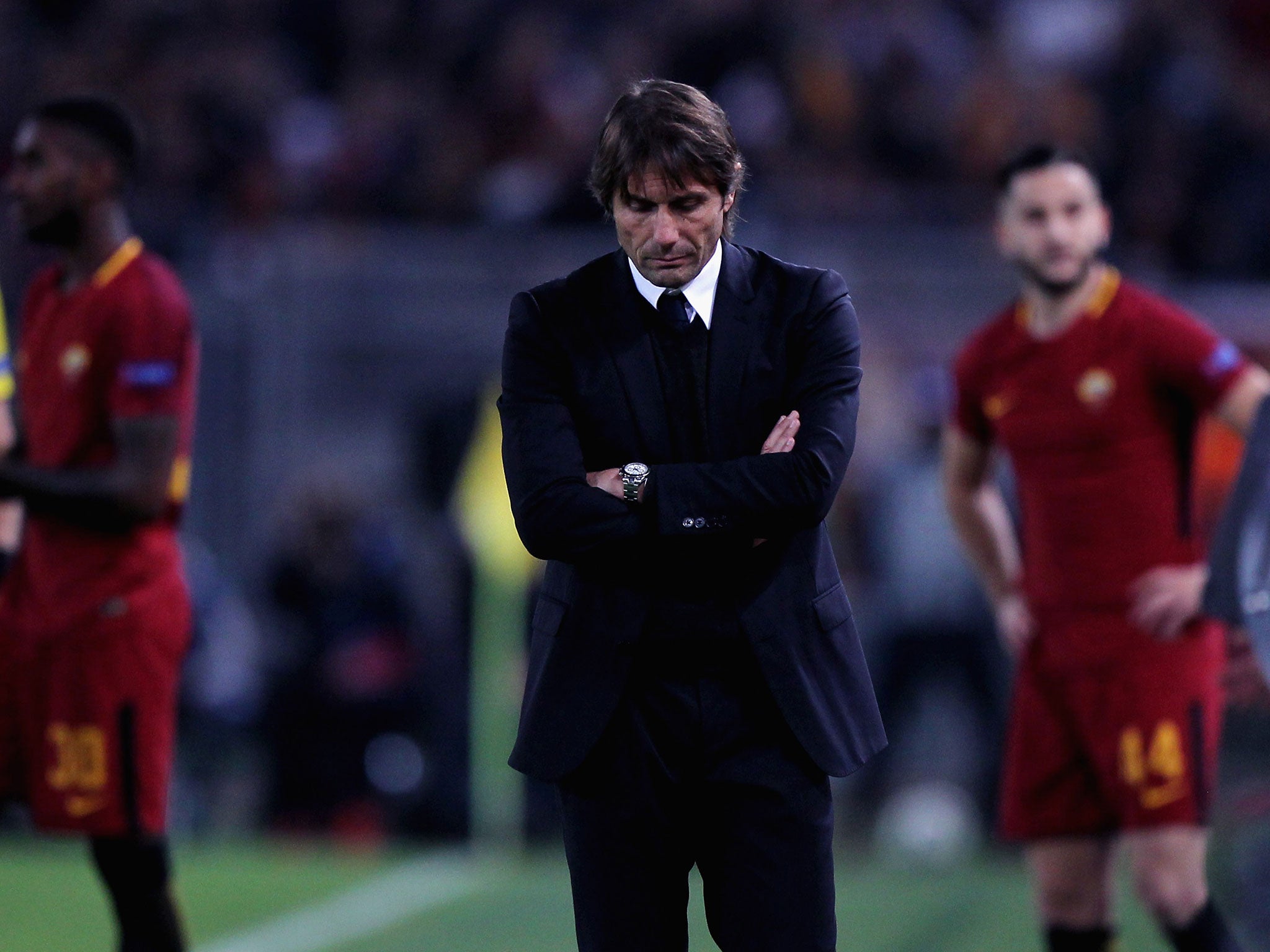 Antonio Conte looks on after the final whistle in Rome