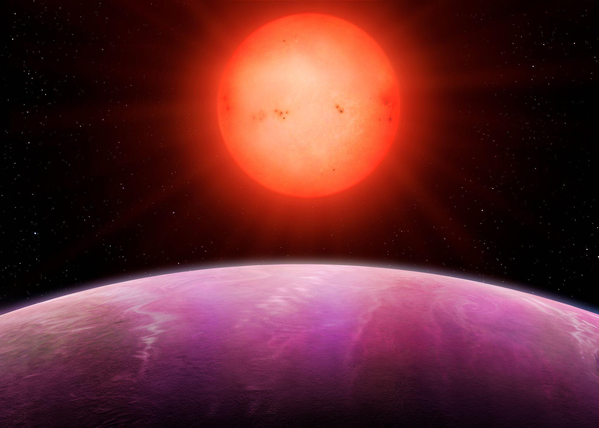 The very small sun rises over the unusually large "monster" planet