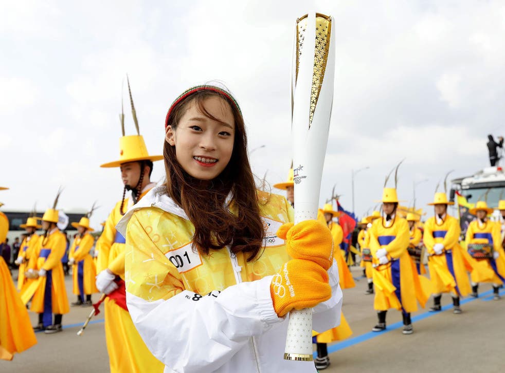 The flame touched down in South Korea on Wednesday