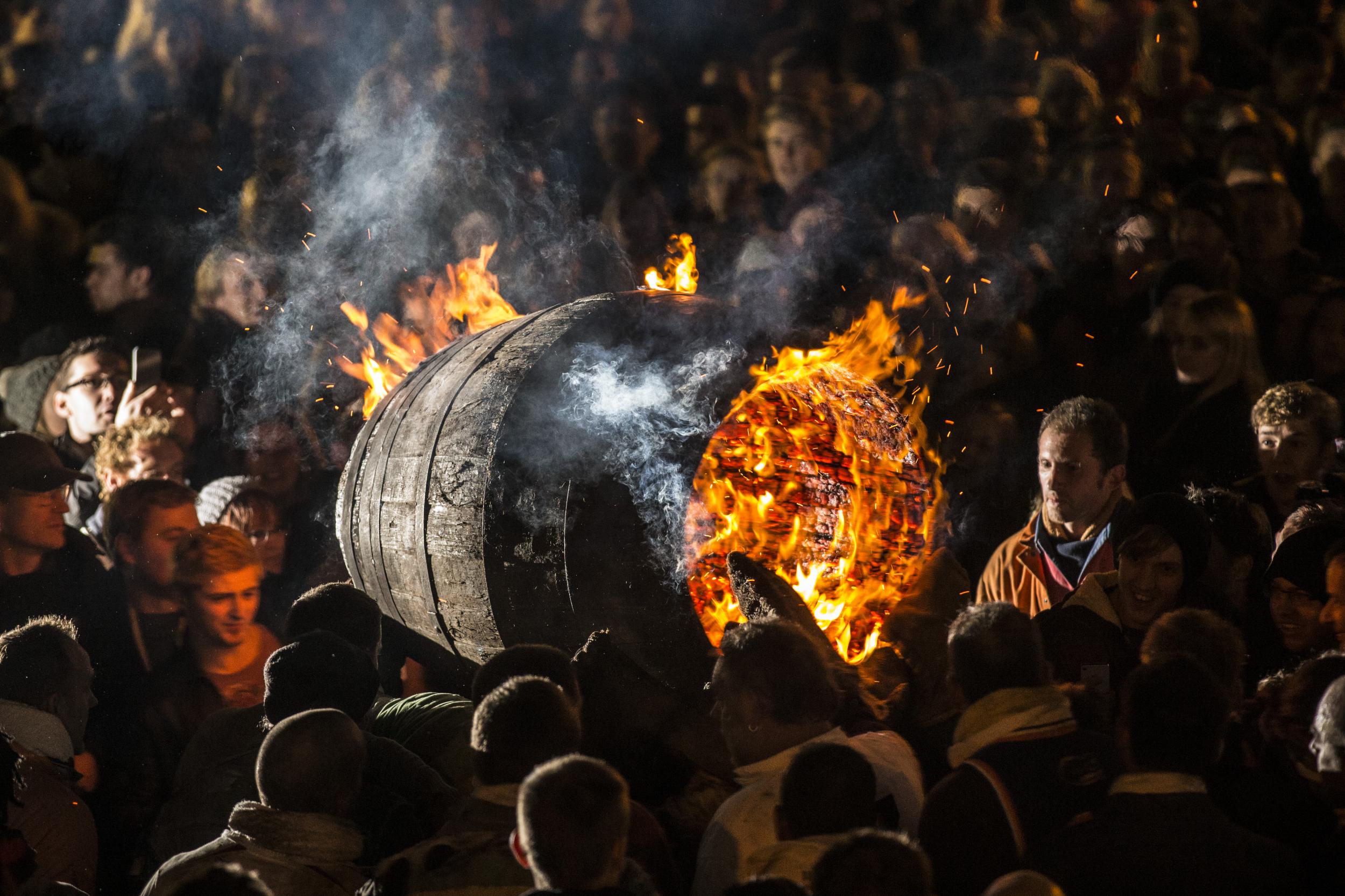 Flaming barrels carried through the streets in Ottery St Mary