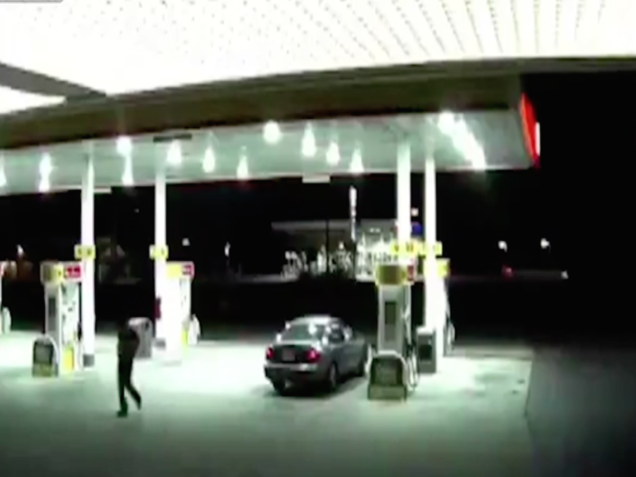 The moment when the kidnapper walks toward the gas station; LiveLeak