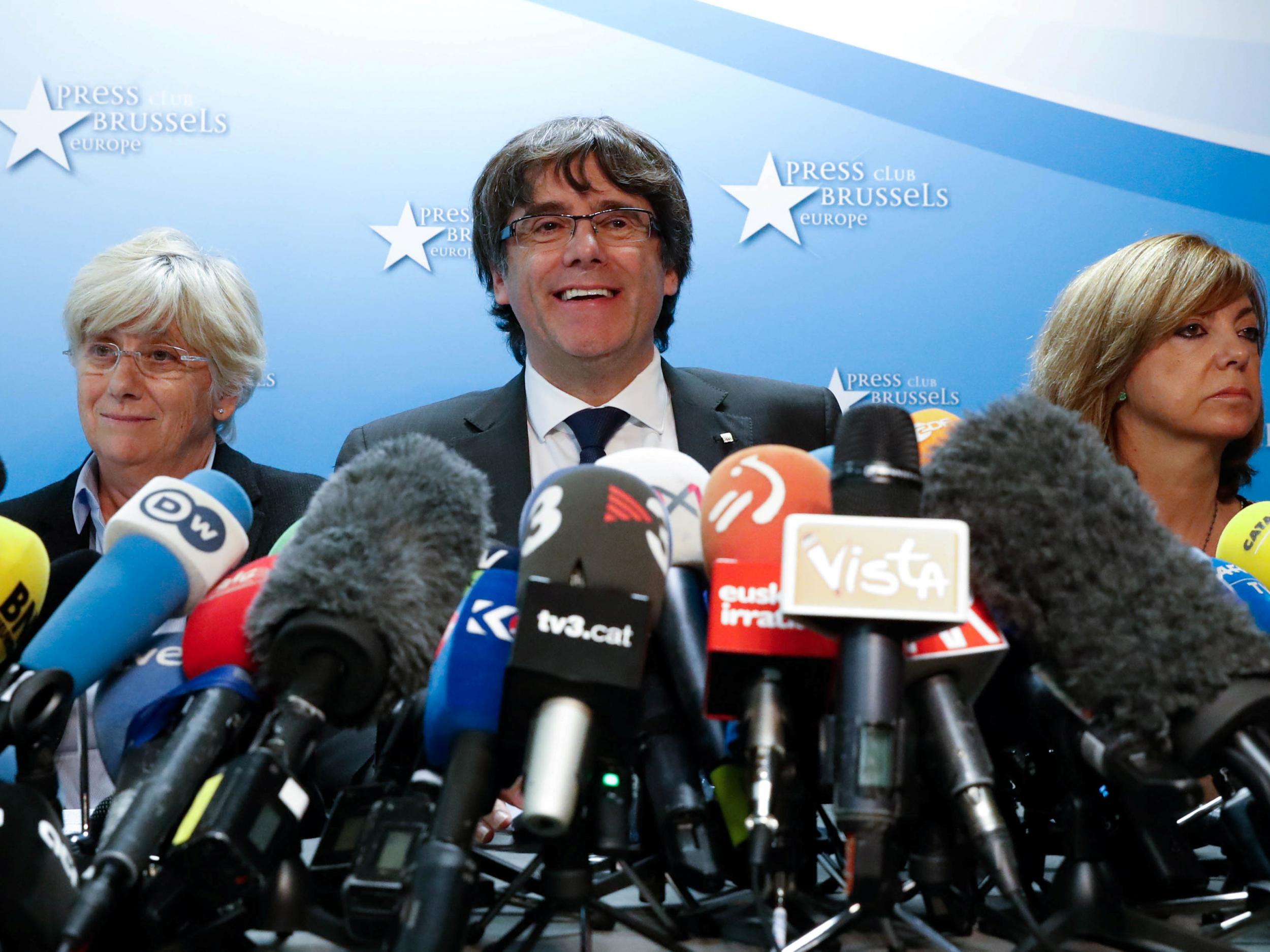 Sacked Catalan leader Carles Puigdemont and former member of the Government of Catalonia Clara Ponsati attend a news conference at the Press Club Brussels Europe in Brussels, Belgium