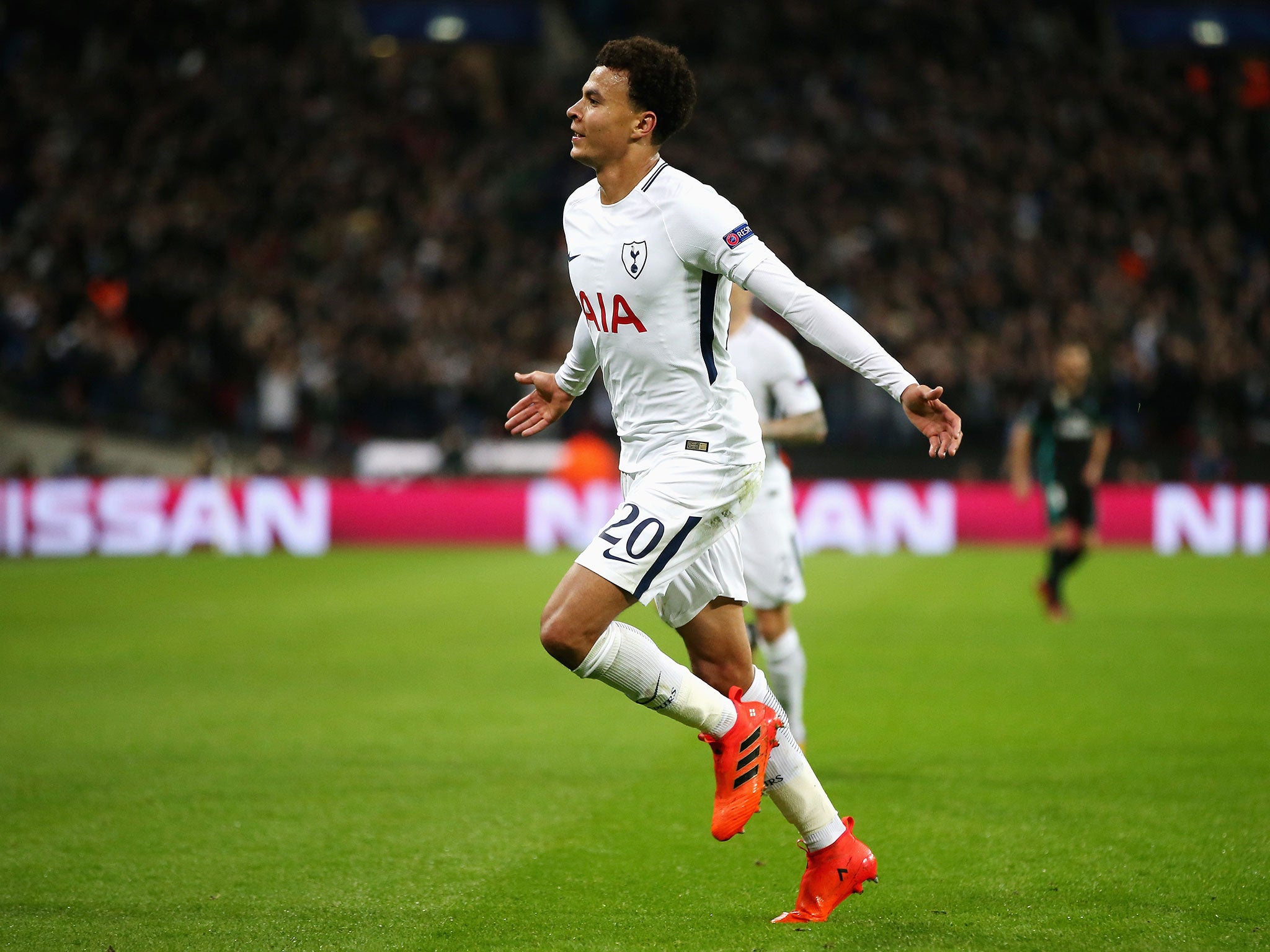 Dele Alli celebrates doubling the lead for Tottenham at Wembley
