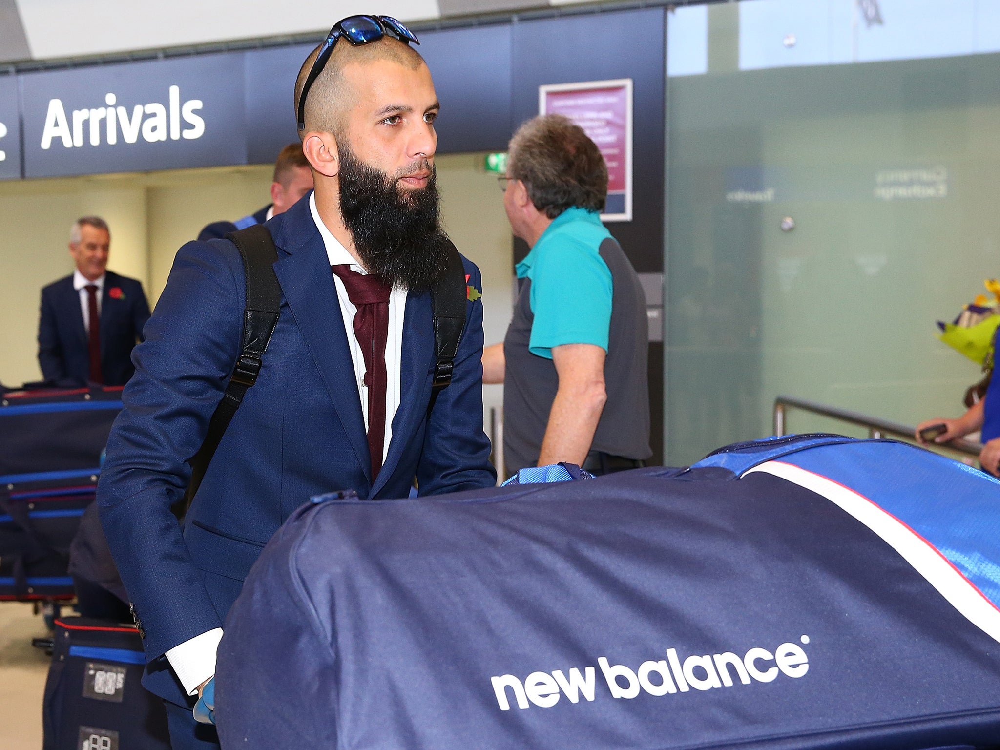 Moeen Ali arrives with the England squad in Australia ahead of the Ashes tour