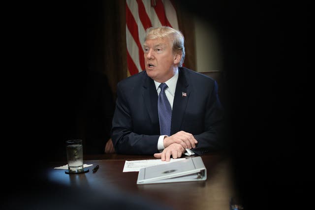 Donald Trump speaks while meeting with members of his cabinet on 1 November