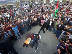 Thousands of Palestinians march and burn May effigy in Balfour protest