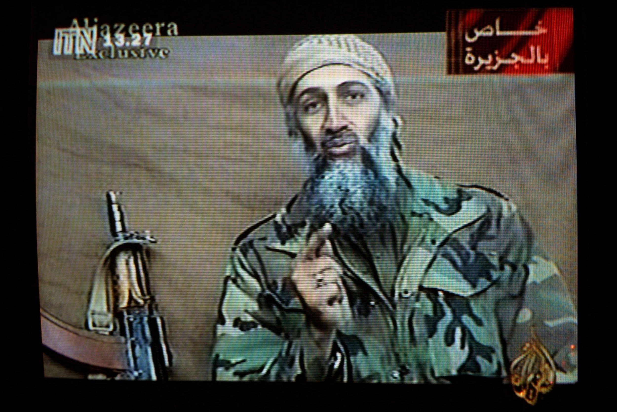 A videotape released by Al-Jazeera TV featuring Osama bin Laden is broadcast in Britain December 27, 2001