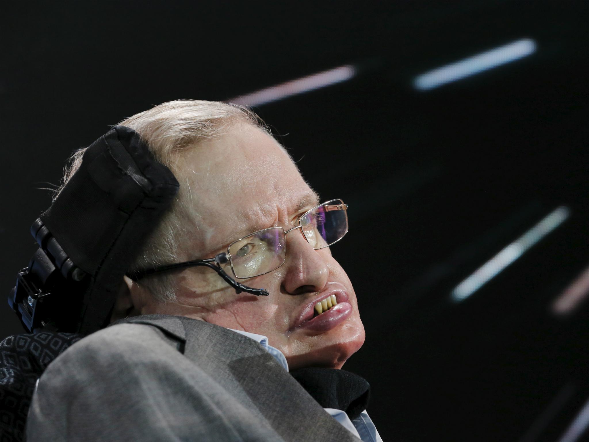 Physicist Stephen Hawking sits on stage during an announcement of the Breakthrough Starshot initiative with investor Yuri Milner in New York April 12, 2016