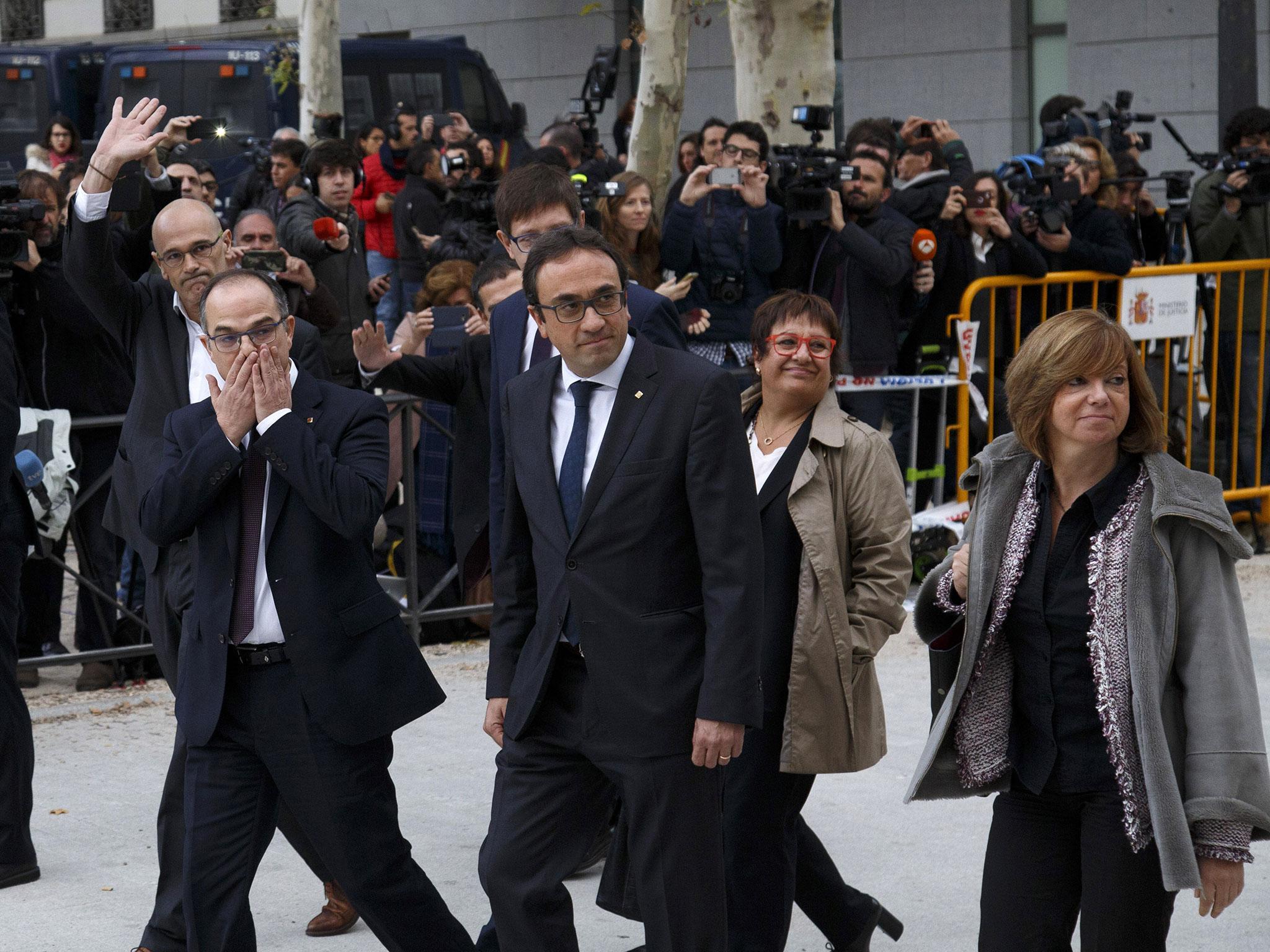 L-r: deposed Catalan leaders Raul Romeva, Josep Rull, Carles Mundo, Jordi Turull, Dolors Bassa and Meritxell Borras arrive at Spain's National High Court ahead of the hearing