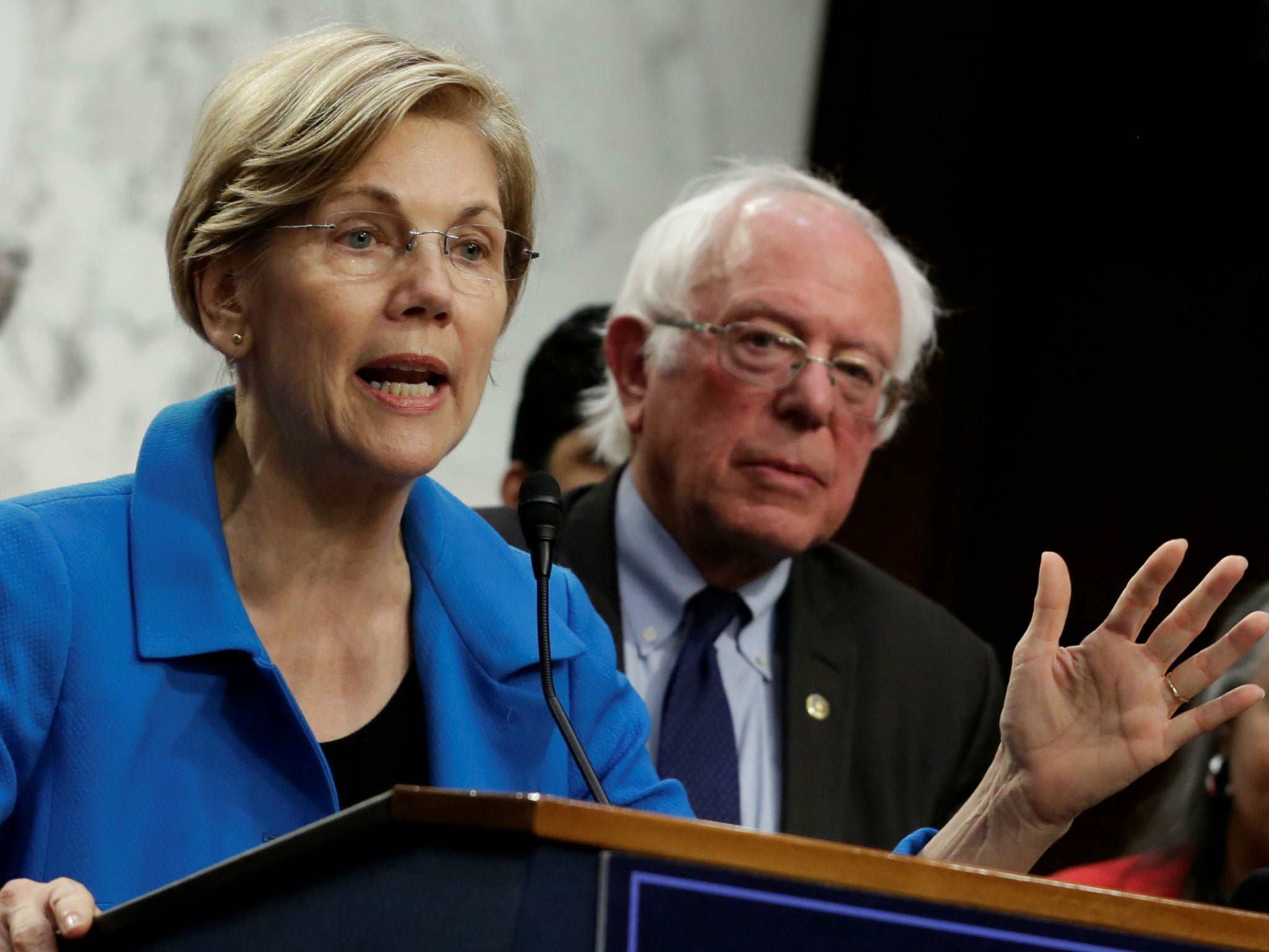 Senator Elizabeth Warren and Senator Bernie Sanders promote universal healthcare in Washington on September 13, 2017