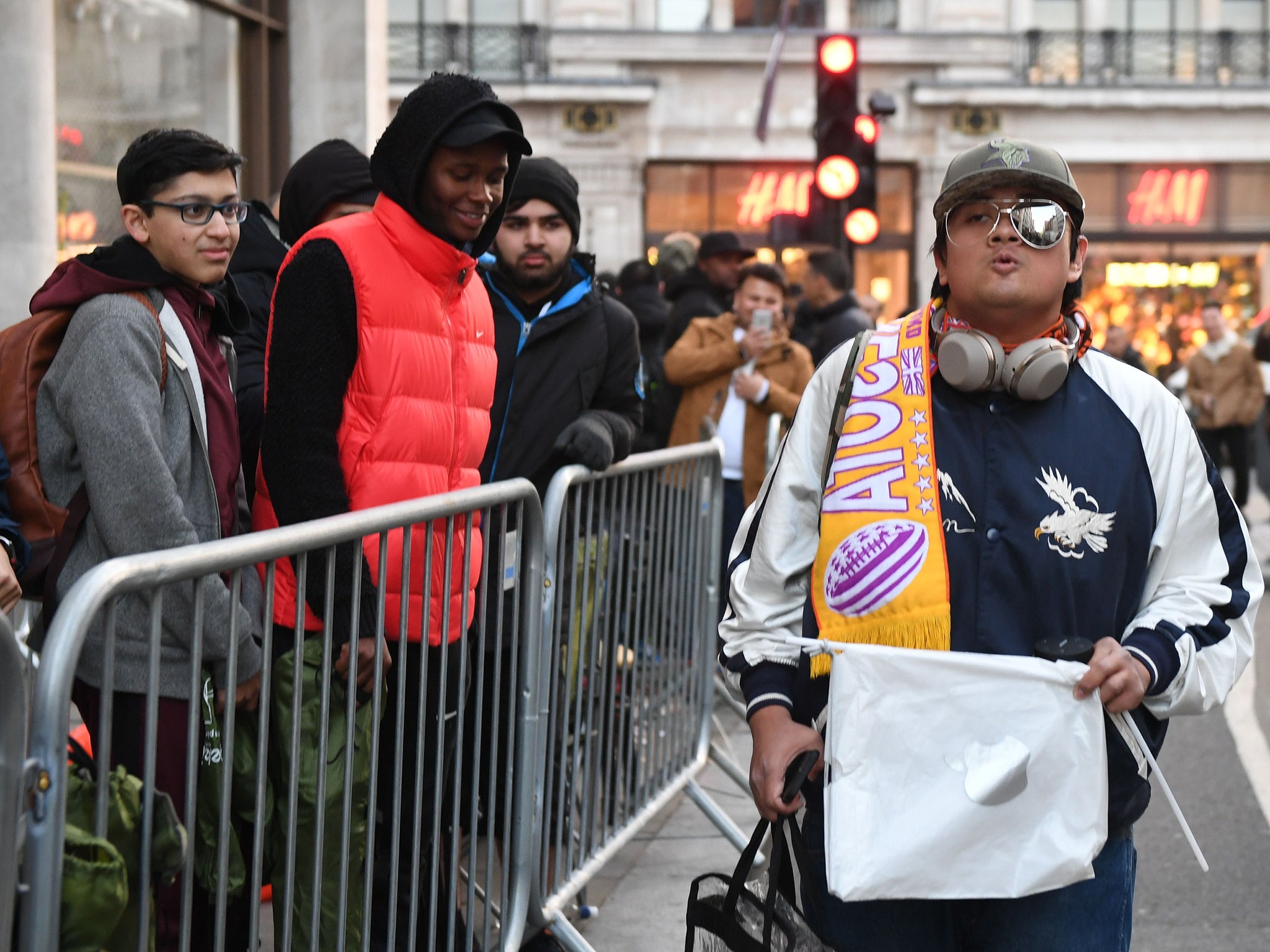 People queue outside Apple's Regent Street store
