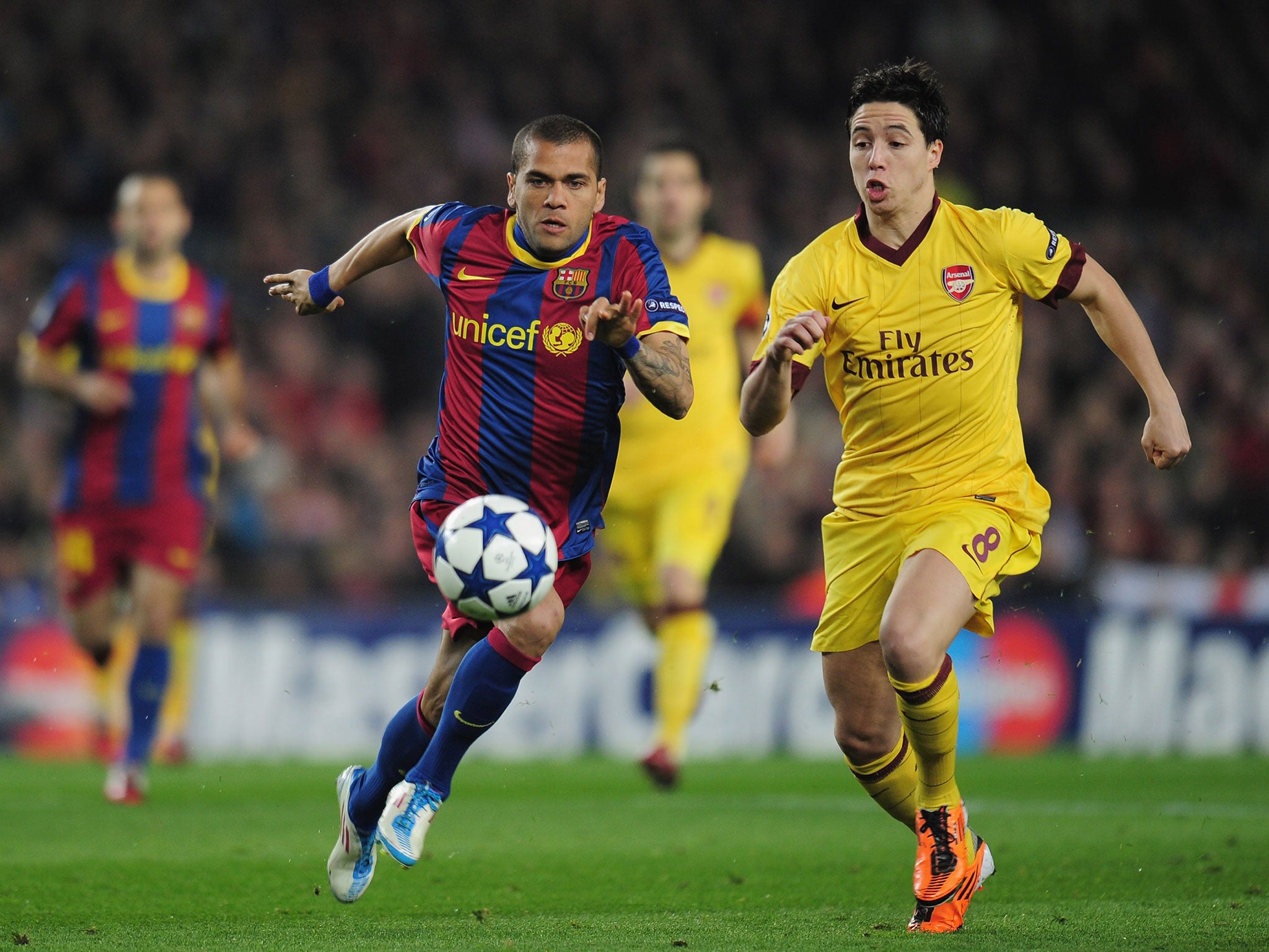 Dani Alves in action for Barcelona against Arsenal in 2011