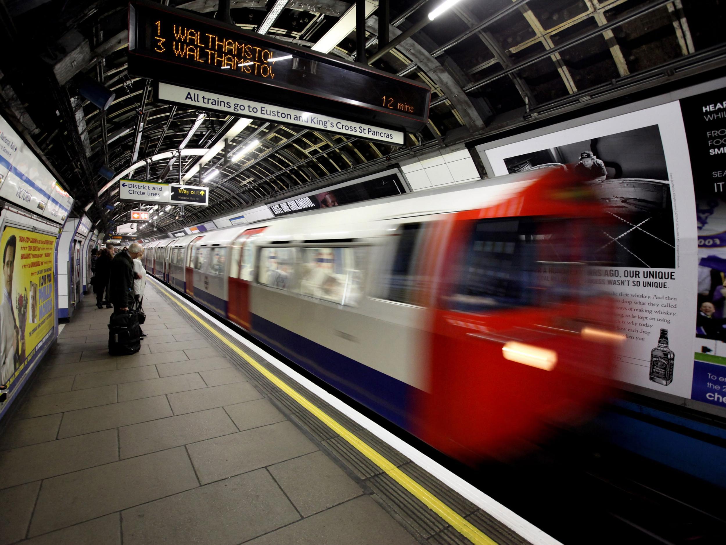 A student was placed in a headlock by two attackers on a Jubilee line train who forced him to apologise for being gay