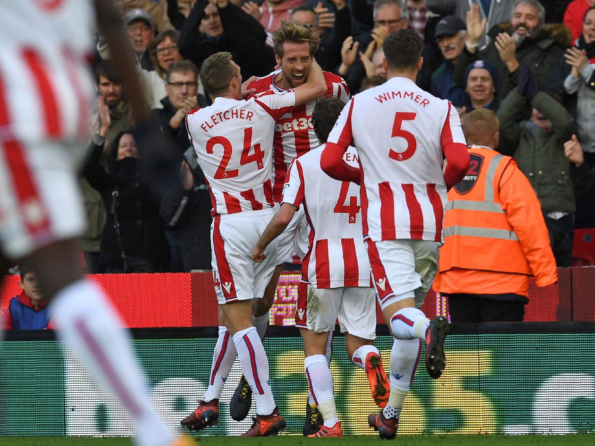 Peter Crouch climbed off the bench to earn Stoke a point