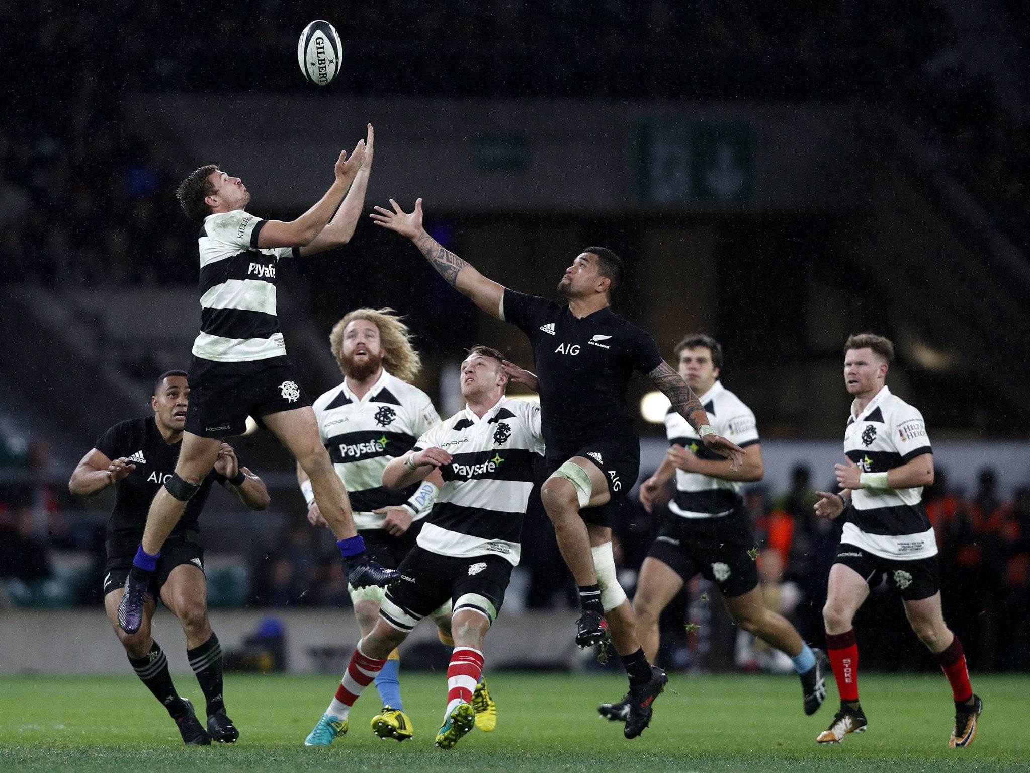 George Bridge and Vaea Fifita compete for a high ball