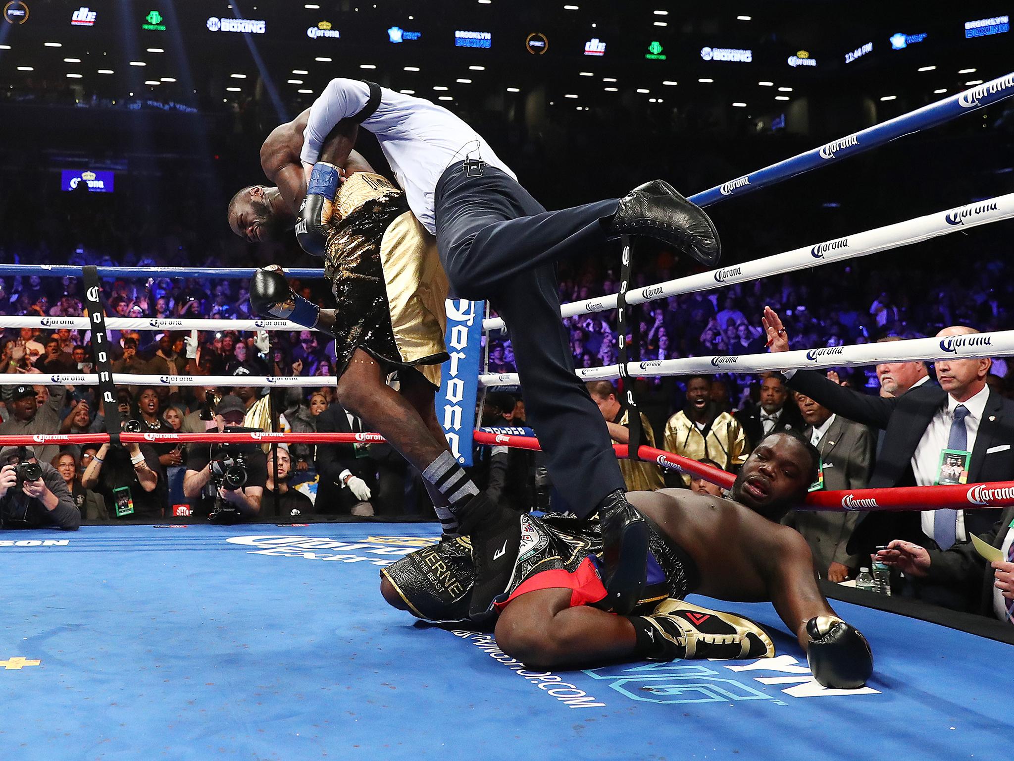 Deontay Wilder beat Bermane Stiverne in the first round to retain his WBC heavyweight title