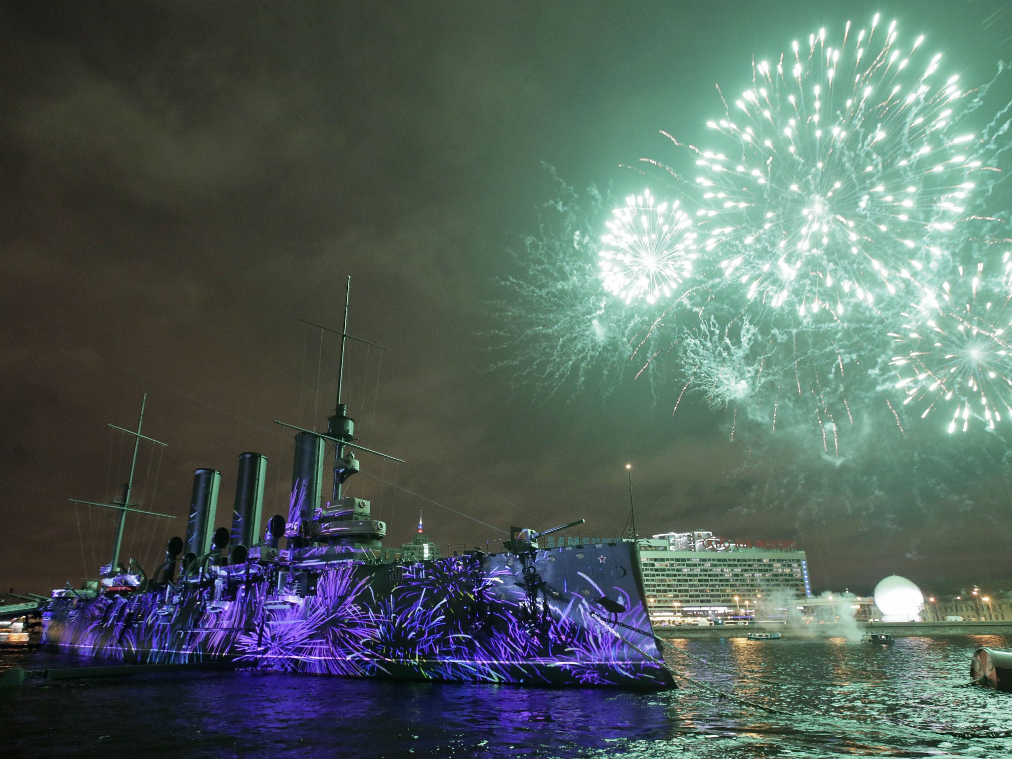Fireworks explode over the Aurora cruiser marking the centenary of the Bolshevik Revolution in St Petersburg