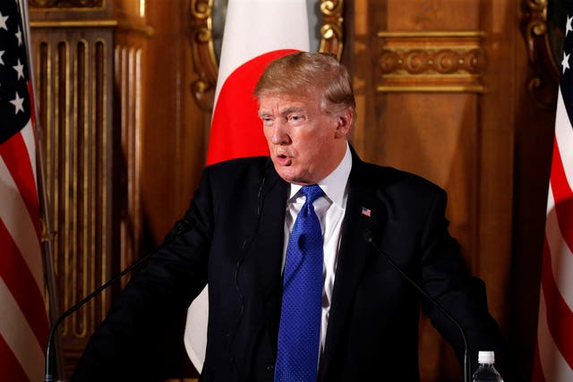 US President Donald Trump speaks during a news conference with Japan's Prime Minister Shinzo Abe at the Akasaka Palace in Tokyo
