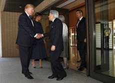 Donald Trump greets Japanese Emperor Akihito without bowing 