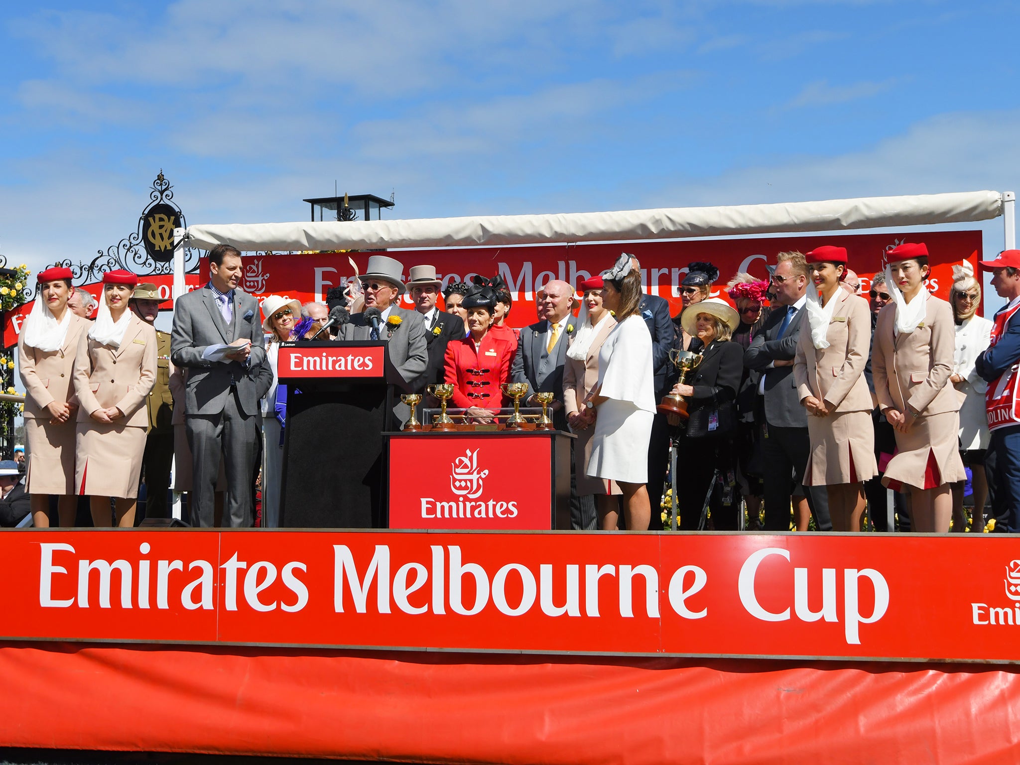 Rekindling owner Lloyd Williams is presented with the Melbourne Cup