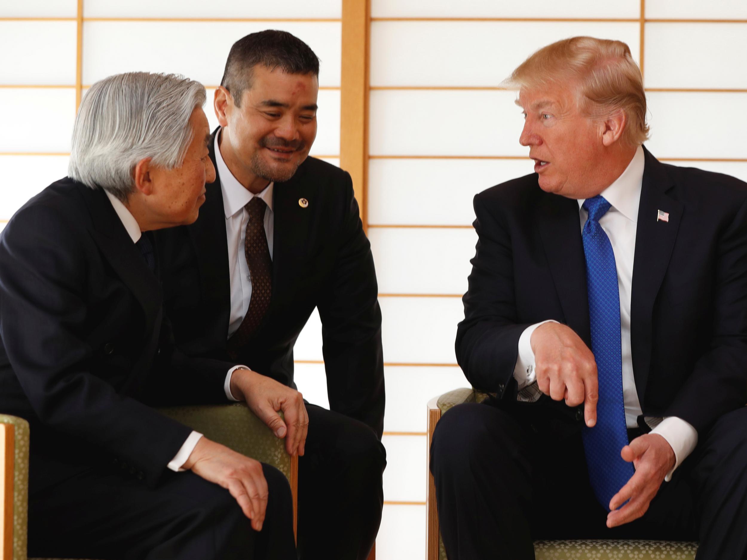 President Donald Trump talks with Japan's Emperor Akihito during their meeting at the Imperial Palace in Tokyo
