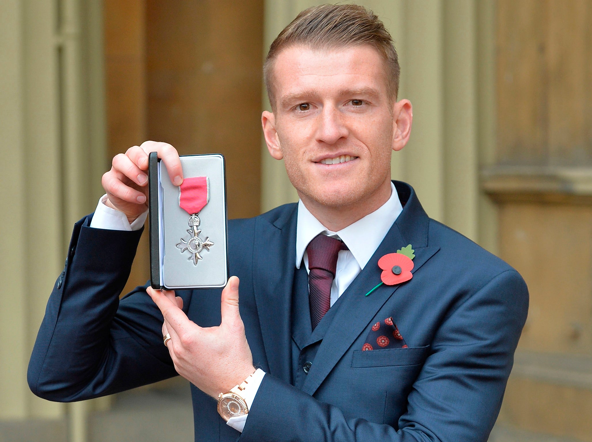 Davis receiving his MBE at Buckingham Palace last week
