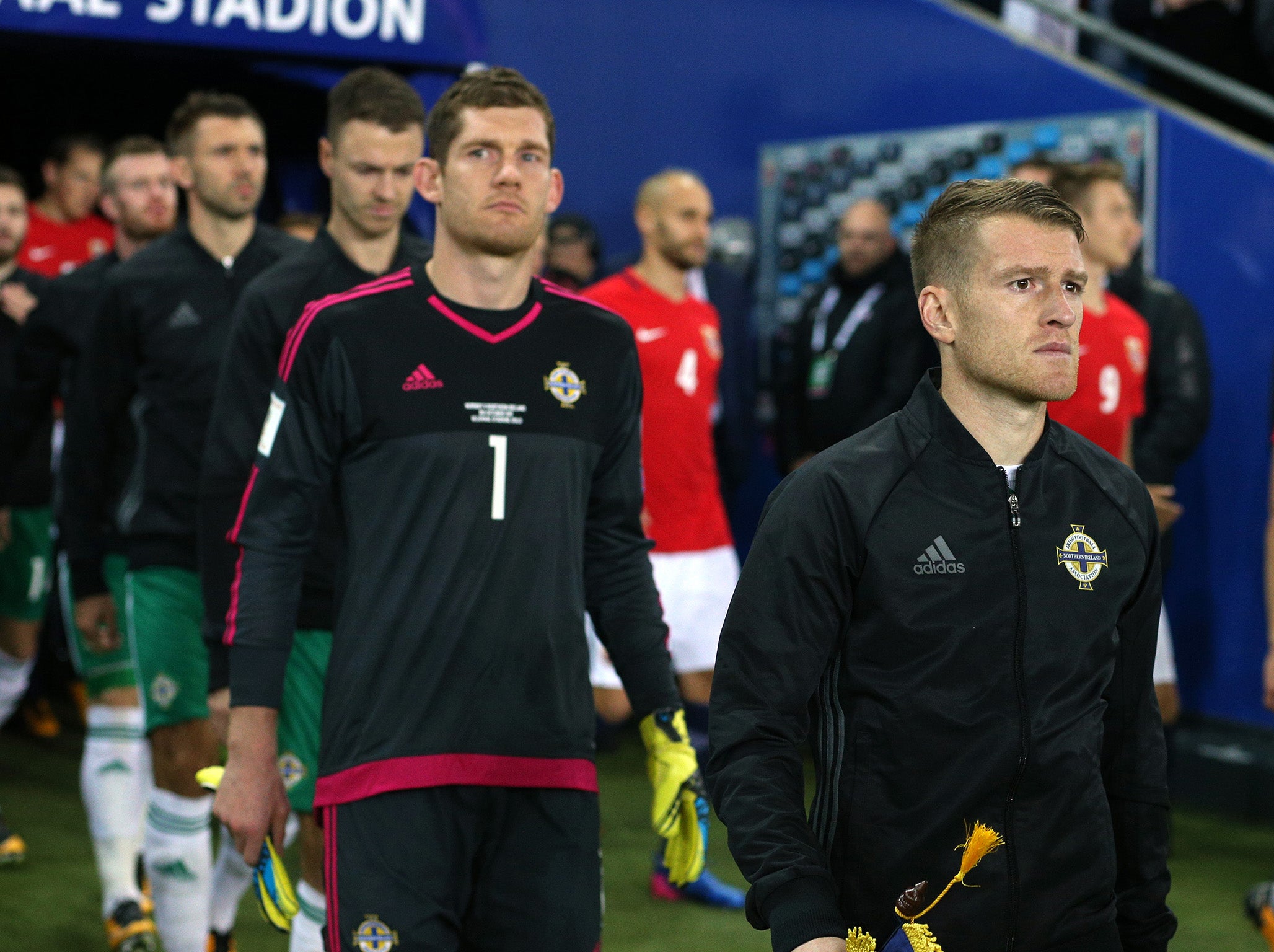 Davis leading his team out against Norway