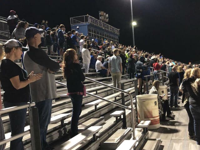 Community members gather at La Vernia High School for a vigil for the victims of the Sutherland Springs shooting