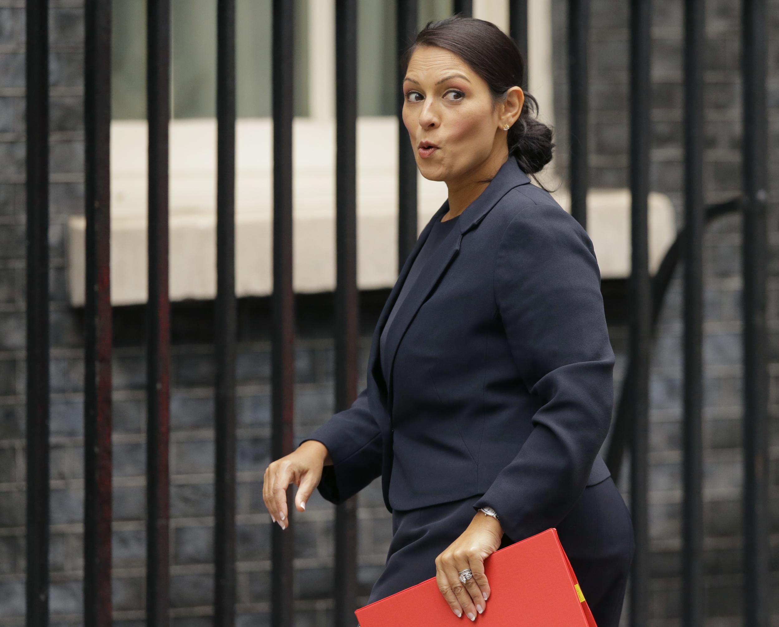 One suspects Ms Patel may not look so chirpy when she walks in to Downing Street shortly