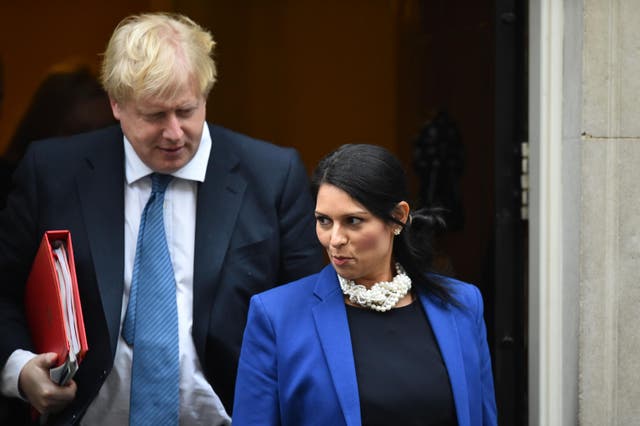 Conservative Politicians Priti Patel (right) and Boris Johnson