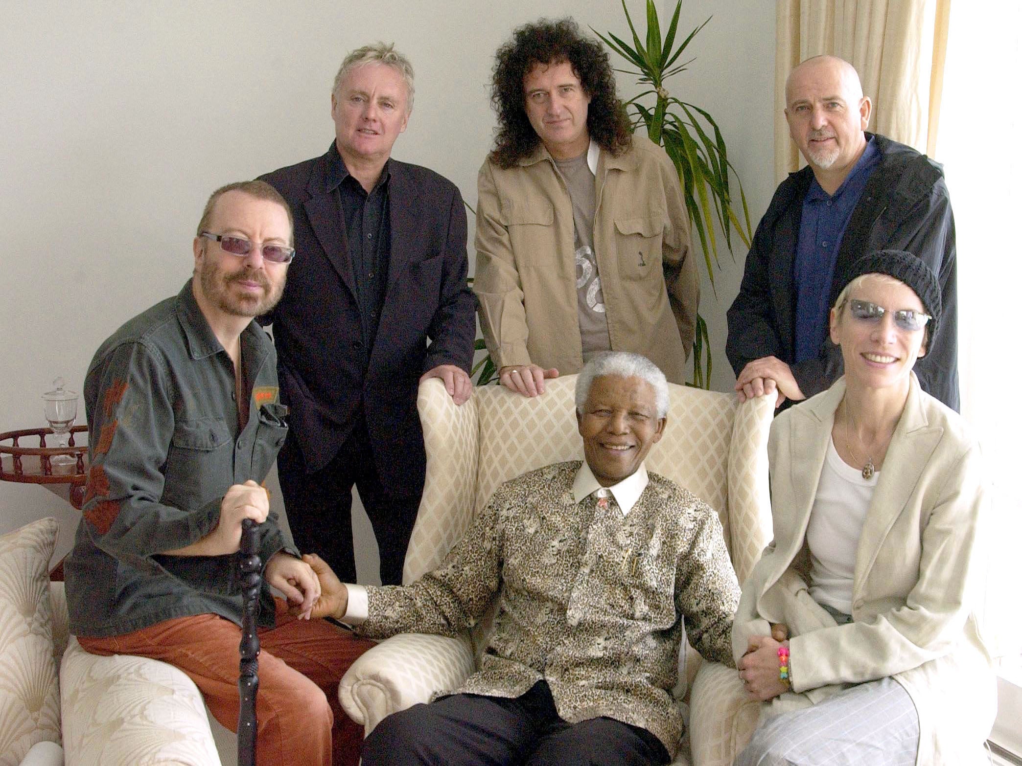 Lennox (right) meets Nelson Mandela with (from left) fellow Dave Stewart, Queen stars Roger Taylor and Brian May, and Peter Gabriel, before Mandela’s 46664 AIDS charity concert in Cape Town, South Africa, in 2003