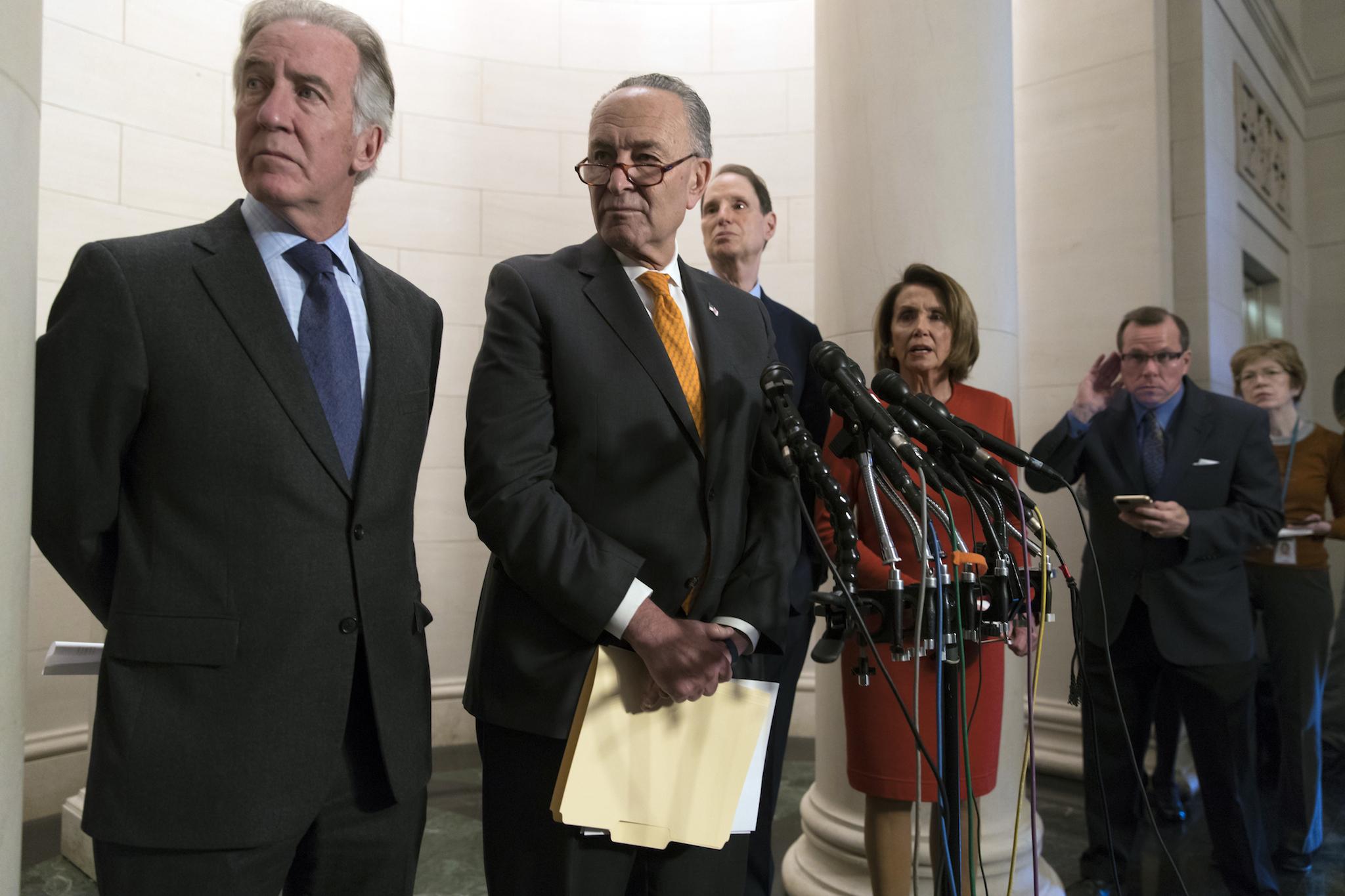Top Democrats hold a news conference to criticise the Republican tax reform being debated in Congress (AP Photo/J. Scott Applewhite)