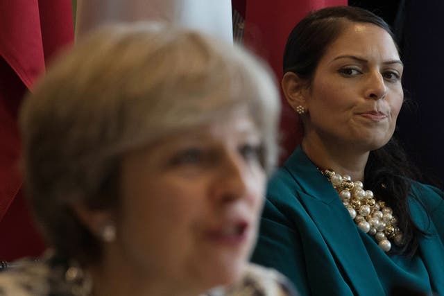 Priti Patel (right) and Prime Minister Theresa May