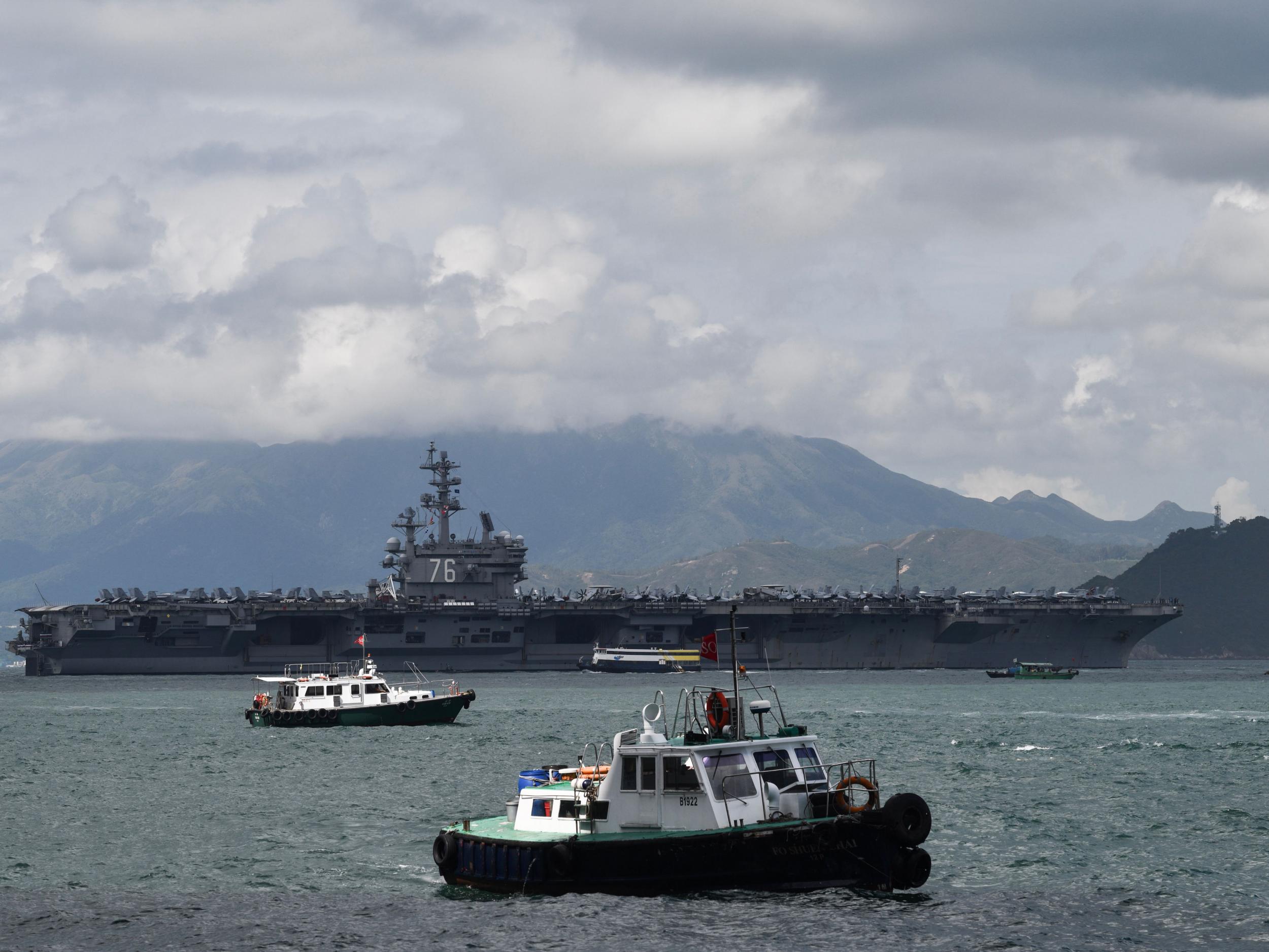 USS Ronald Reagan is one of three aircraft carriers involved in display of military might