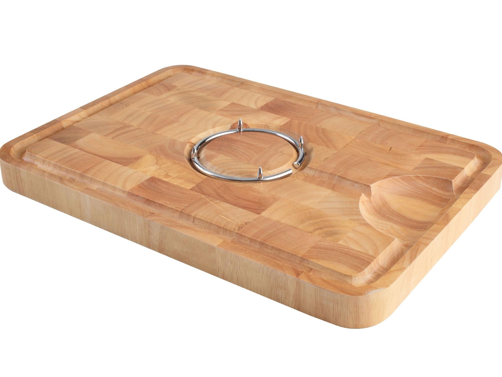 Carving board with removable spiked metal ring, £34.95, steamer.co.uk
