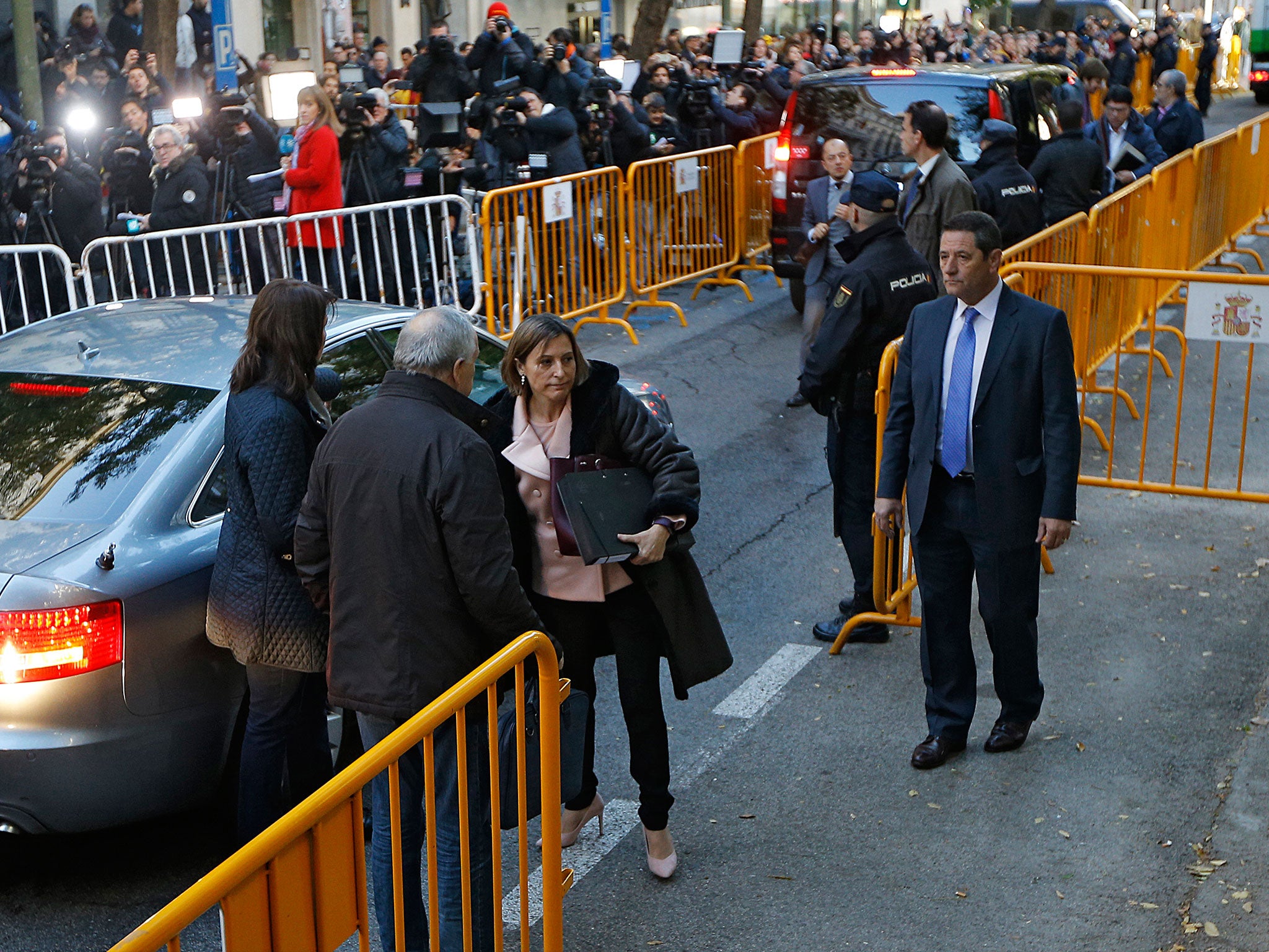 Ex-speaker of the Catalonia parliament Carme Forcadell, centre, arrives at the Supreme Court in Madrid