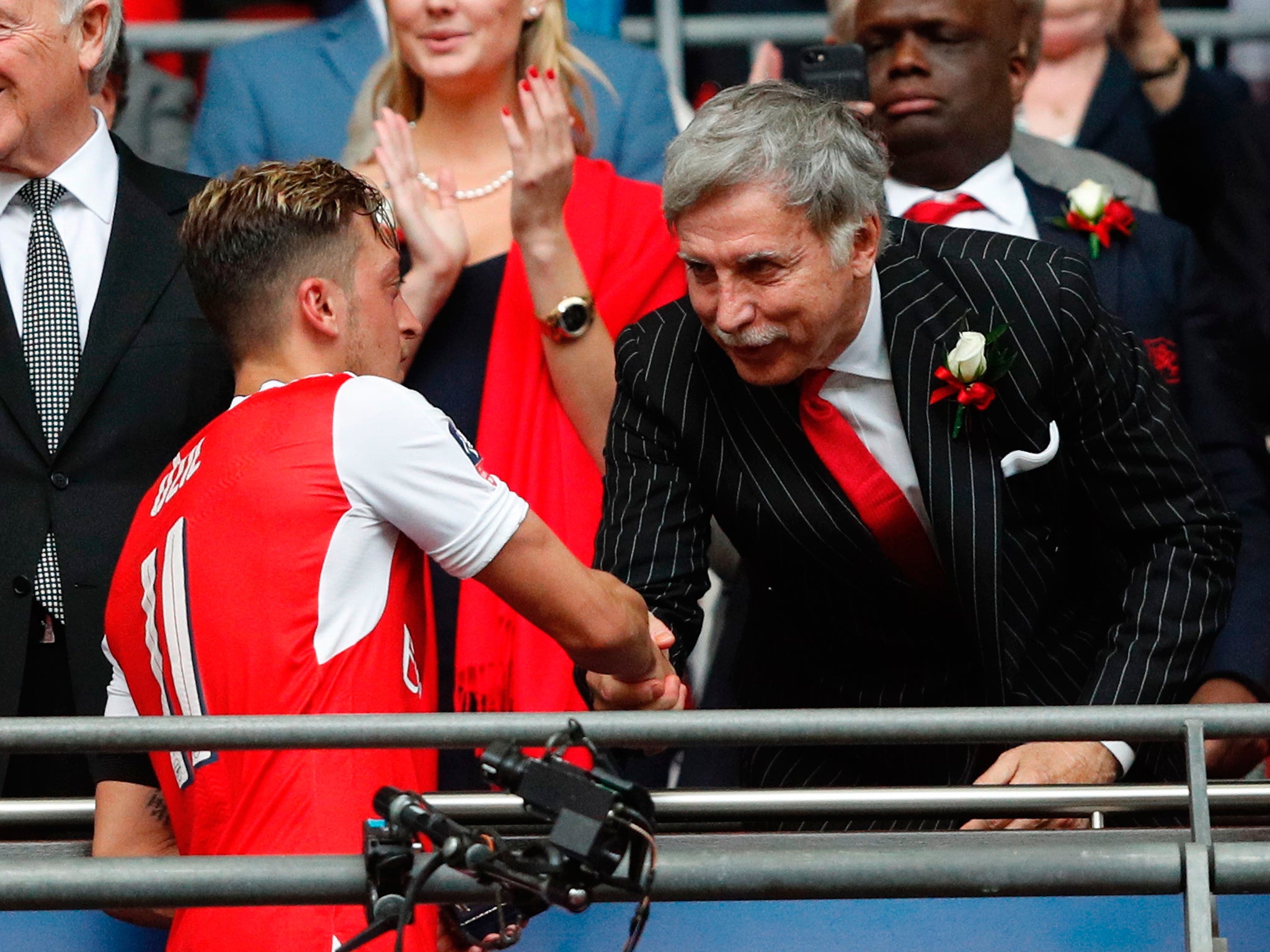 Arsenal's Stan Kroenke has faced a fan backlash since buying a majority share of the club