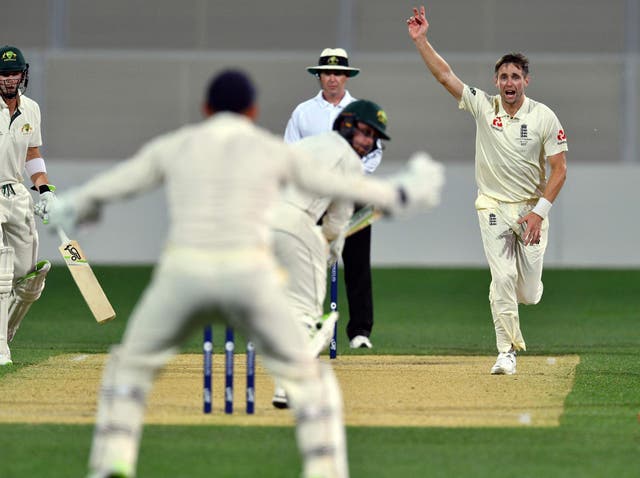 Chris Woakes' four late wickets put England on the verge of victory in Adelaide