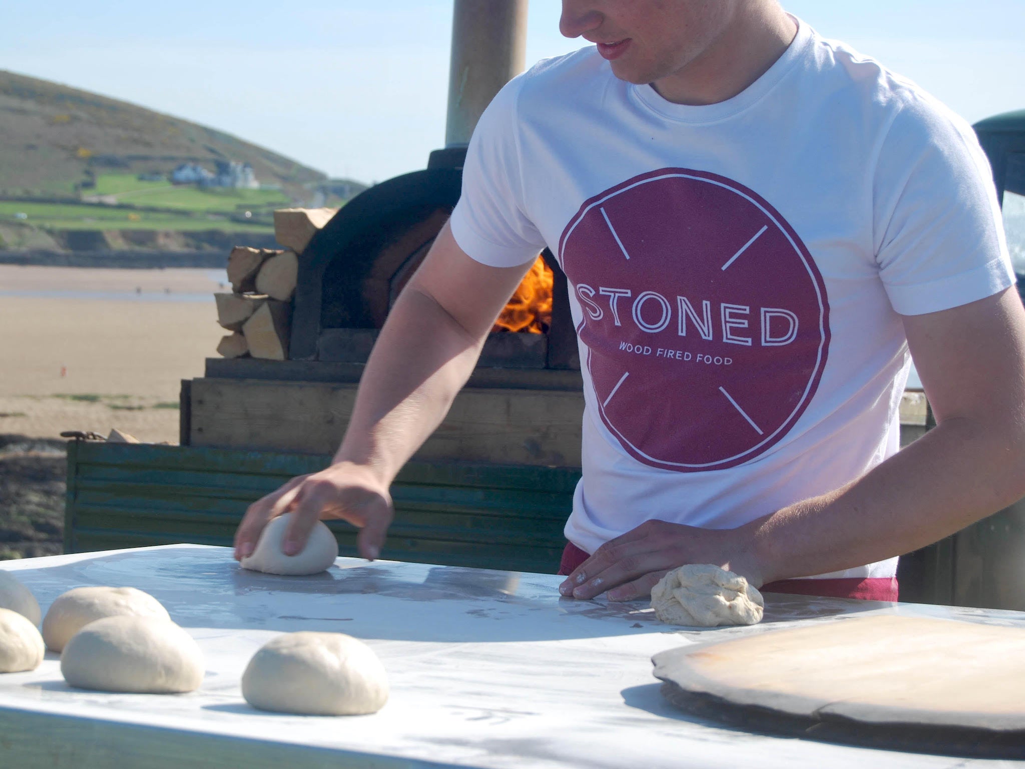 ‘Making pizza on the beach with the sun setting, you can’t really top that as a job’